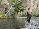 Президент России Владимир Путин на рыбалке на реке Хемчик, которая протекает на территории южной Сибири.