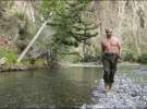 Президент России Владимир Путин на рыбалке на реке Хемчик, которая протекает на территории южной Сибири.