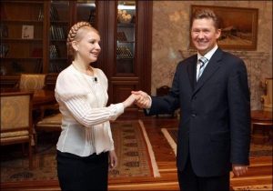 Юлія Тимошенко на переговорах з головою ”Газпрому” Олексієм Міллером 21 лютого під час свого візиту до Росії