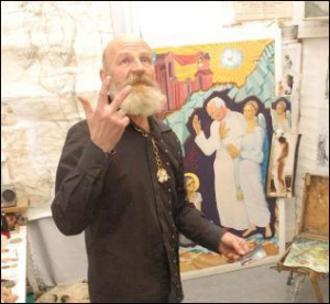 Киевский художник Владимир Кальненко возле картины для Ватикана в своей мастерской