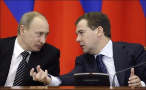 Путин и Медведев во время конференции в Сочи. 23 марта 2009