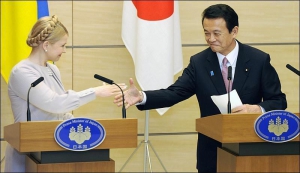 имошенко и премьер Японии Таро Асо в Токио. Март 2009 год. Весной этого года Тимошенко провела ряд встреч с японским руководством.