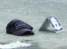 Після зіткнення автомобілів на дорозі в бік Борисполя залишилася кепка одного з постраждалих