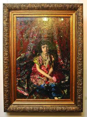 Картині Михайла Врубеля ”Дівчинка на тлі перського килима” поміняли скло і раму