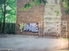 Юрко Кох в роботі показав усі надписи до чемпіонату, якими щедро рясніють львівські мури