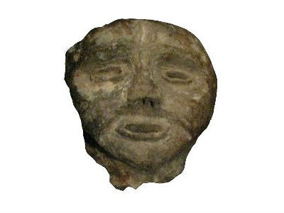 Зображення людського обличчя на люльці, виявленої на території городища