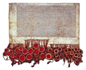 Акт Люблінської унії 1 липня 1569 року. Його підписали 114 послів сейму з Польського Королівства та 48 – з Великого князівства Литовського. Кожен прикладав свого персня з родовим гербом до сургучевої печатки. Поляки вживали червоний (ліворуч), а литвини – зелений (праворуч). У сеймі, який у Любліні ухвалював акт унії, брали участь представники вищого духовенства, шляхетських родів та деяких магістратів. Унія зрівнювала у правах шляхту Корони Польської та Великого князівства Литовського. Територію теперішньої України приєднали до польської частини Речі Посполитої, а Білорусь лишили у литовській. Так поділили руські землі, що перед тим майже всі належали Литві