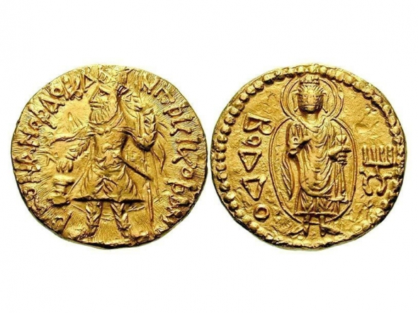 Монета Кушанського царства з зображеннями царя Канишки і Будди