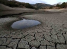 ...а у сусідній Каліфорнії - аномальна спека. Ось так виглядає пересохле водосховище Альмаден біля міста Сан-Хосе. США, 28 січня 2014.