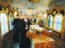 Патріарх Російської православної церкви Кирило біля хреста Апостола Андрія. Київ, 28 липня 2013 року