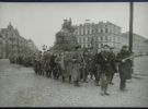Ноябрь 1943 года, партизанские отряды идут парадным строем по Софиеской площади