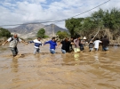 После наводнения в городе Копьпо, Чили, 26 марта 2015