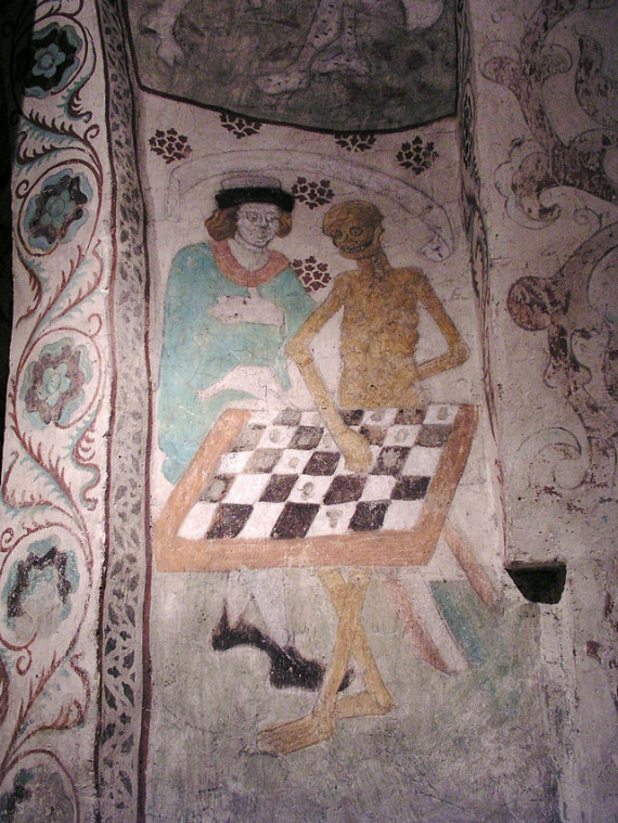 ыцарь играет в шахматы со смертью. Средневековая гравюра.