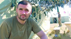Доброволець батальйону ”Донбас” Олександр Сарабун: ” На передовій складно ходити з протезом по болоту. У траві заплутується”