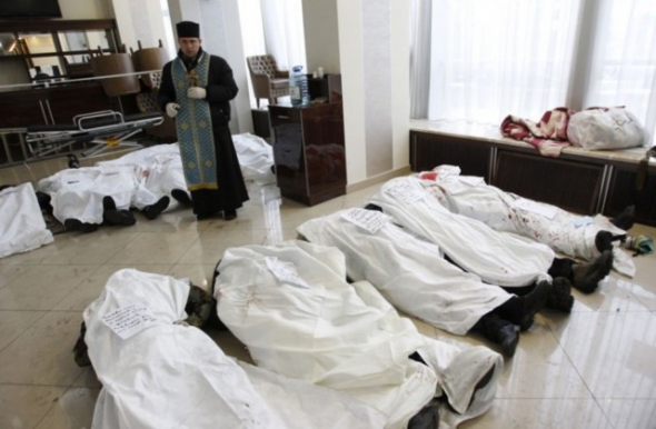 Тіла вбитих у готелі "Україна"