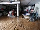 Германия, 30 мая 2016: помещение спортивного магазина у Швебиш-Гмюнде после наводнения