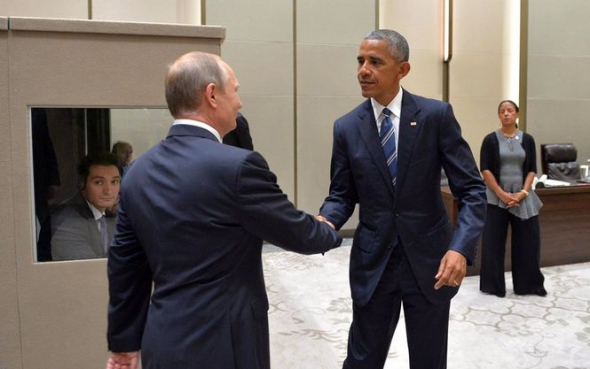 Барак Обама и Владимир Путин во время саммита G20