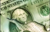 Нацбанк понизил официальный курс доллара