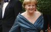 Меркель меняет мужскую одежду на роскошные открытые платья (ФОТО)