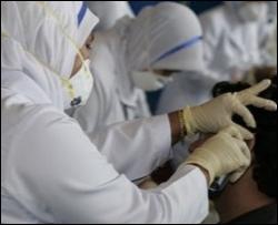 Украина надежно защищена от свиного гриппа - Тимошенко
