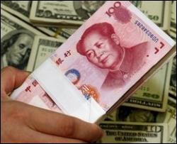 Китайці хочуть замінити долар своєю валютою