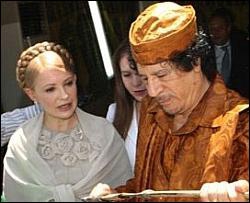 После встречи с Путиным Тимошенко поспешила к Каддафи
