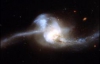 Взаємодія галактик змусила світитися чорну діру (ФОТО)