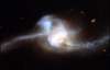 Взаємодія галактик змусила світитися чорну діру (ФОТО)