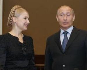Путина в Крыму встретили с плакатом &quot;Тимошенко - кризис - беда&quot;