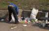 Безпритульних найняли прибирати набережну в Києві (ФОТО)