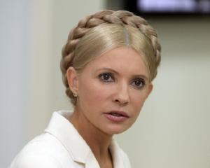 Тимошенко про новий дрес-код Азарова:королева Англії не потрапила б до Кабміну