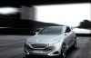 Peugeot показал новый концепт гибридного кроссовера SXC