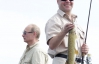 Путин поймал окуня, а Медведев похвастался щукой