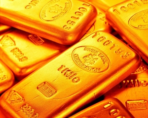 Золото подешевшало після вчорашнього цінового рекорду