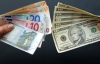Долар росте відносно євро на сигналах ослаблення світової економіки