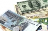 Доллар растет к евро на негативе из Испании
