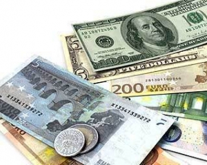 Долар росте до євро на негативі з Іспанії