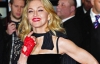 Мадонна приховує вік за допомогою рукавичок