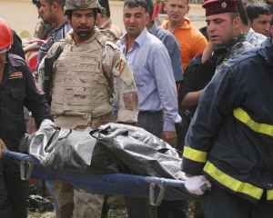 В Ираке &quot;полицейский&quot;-смертник взорвал паломников, 50 человек погибли