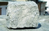 Замість нетесаного каменю на Андріївському  кладуть гранітні блоки
