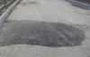 Ремонтники починили пропасть на дороге возле "Арены-Львов"