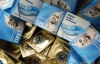 Активист, который раздавал презервативы с Януковичем, получит моральную компенсанцию