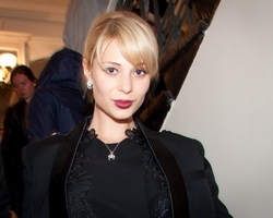 Модница Ольга Янукович любит классическую одежду