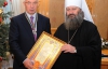 Скандальный настоятель-регионал вручил Азарову высшую церковную награду