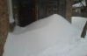 На Святошино частные дома засыпало снегом по окна
