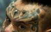 Колумбийский фестиваль тату собрал фриков-любителей качаться на металлических крючках
