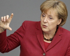 Партия Меркель побеждает на выборах в Германии - экзит-пол 