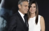 Сандра Баллок в объятиях Джорджа Клуни позировала на премьере фильма "Гравитация"