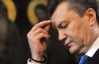 Янукович з Азаровим моляться за міліціонерів, попереду кругли стіл