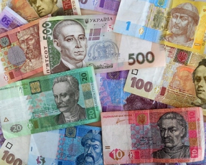 Официальный курс гривни укрепился еще на 14 копеек